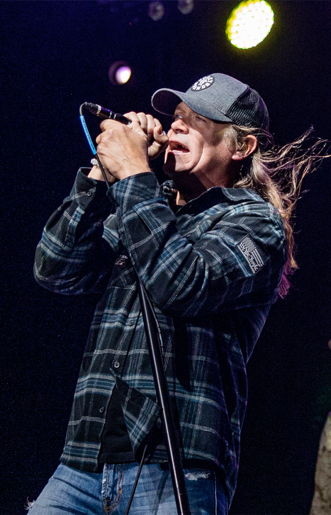 Brad Arnold in 2023.  3 Doors Down band members, perform during the We Salute You Celebration at Victory Field at Marine Corps Air-Ground Combat Center, Twentynine Palms, California, May 6, 2023. Grammy-nominated rock band 3 Doors Down headlined this annual Marine Corps Community Services sponsored event meant to honor Combat Center service members and their families by providing food, activities and live entertainment. (U.S. Marine Corps photo by Lance Cpl. Richard Perez Garcia/Public Domain released by the US Marine Corp)